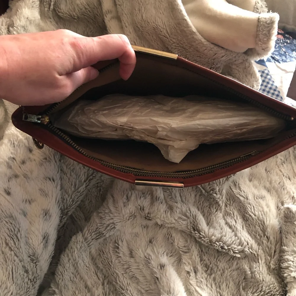 Vintage 1980’s ML Studio rust leather clutch